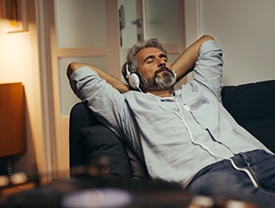 Invisalign patient in Selbyville relaxing at home