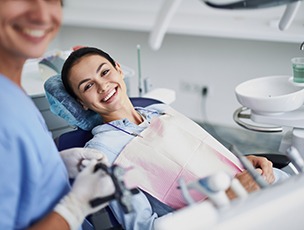 Invisalign patient in Selbyville smiling at dentist