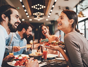 Invisalign patient in Selbyville out with friends