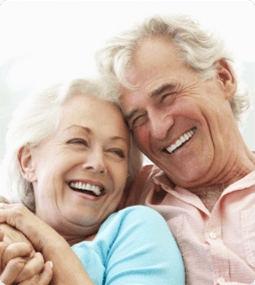 woman leaning back and smiling, looking all satisfied with life, like she just got a couple of free 10-count chicken nuggets